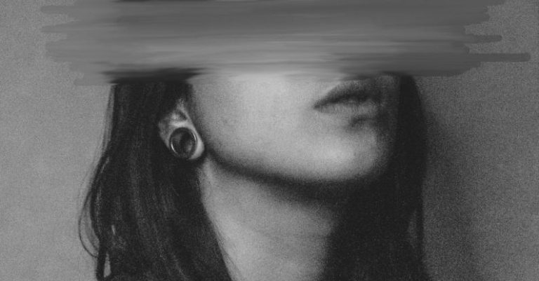 Disorder - Woman with smeared eyes in studio